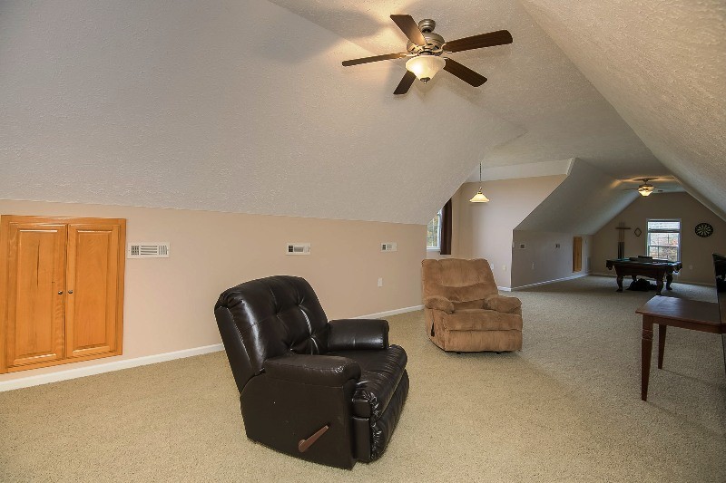 987 Boynton Valley Road Manchester, TN 37355 - Photo 24 of 38 a living room with furniture and a ceiling fan