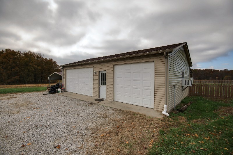 987 Boynton Valley Road Manchester, TN 37355 - Photo 30 of 38 a view of a house with backyard and trees