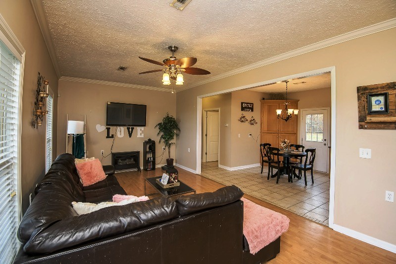 987 Boynton Valley Road Manchester, TN 37355 - Photo 8 of 38 a living room with furniture and a fireplace