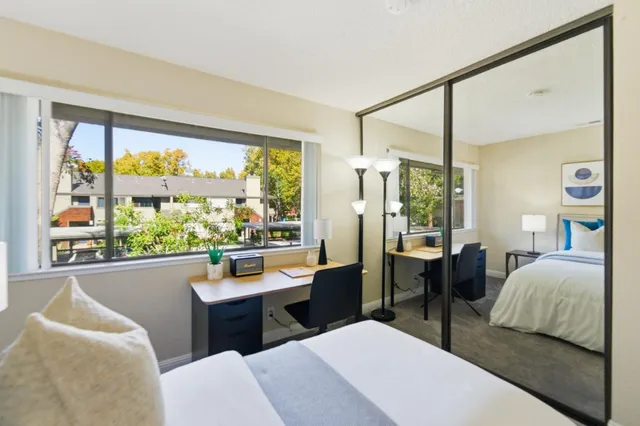 a room with a bed and a table