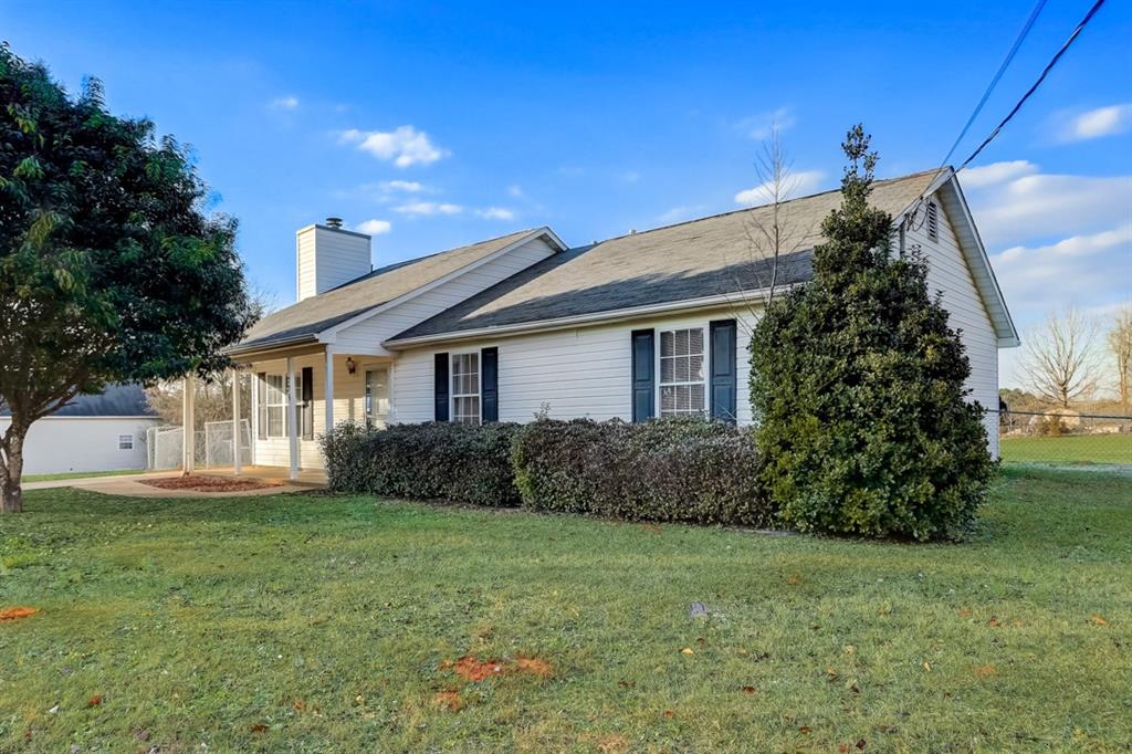 775 Peeksville Road Locust Grove, GA 30248 - Photo 1 of 1 a view of a house with a yard