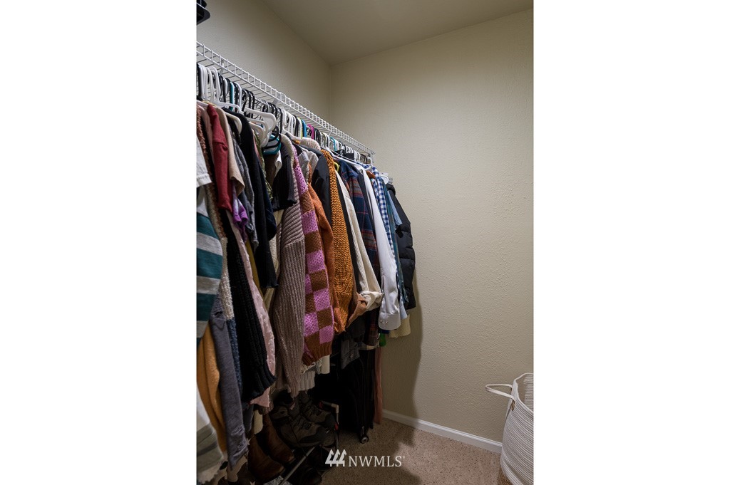 2513 Northeast 4th Street, Unit 331 Renton, WA 98056 - Photo 14 of 21 a view of walk in closet with clothes
