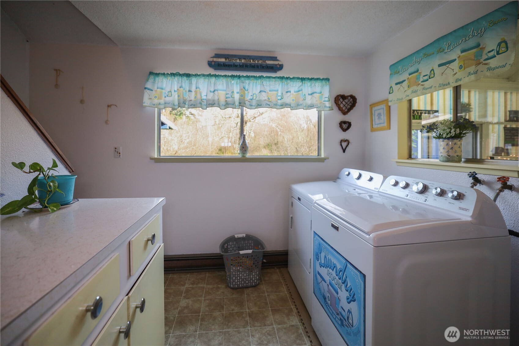 3506 SR 105 Grayland, WA 98547 - Photo 15 of 25 a bathroom with a sink and a vanity