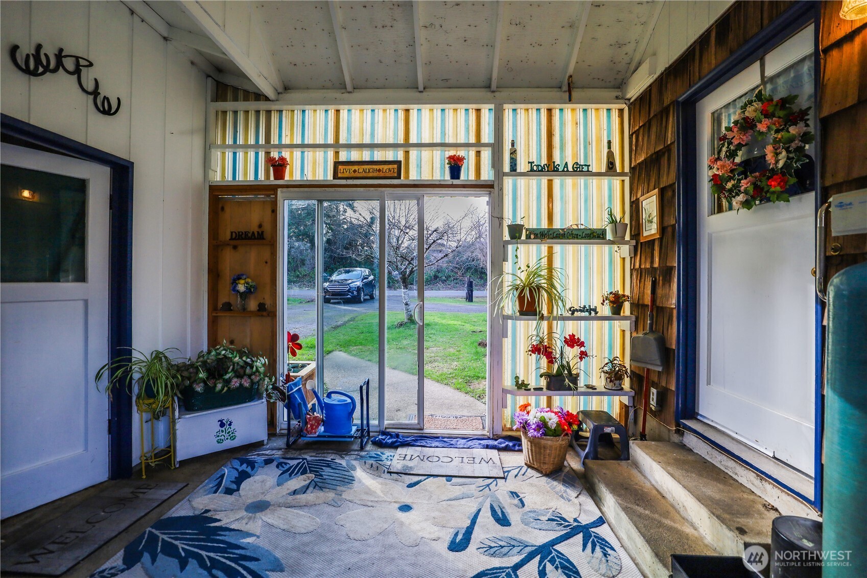3506 SR 105 Grayland, WA 98547 - Photo 18 of 25 a living room with lots of furniture and a potted plant