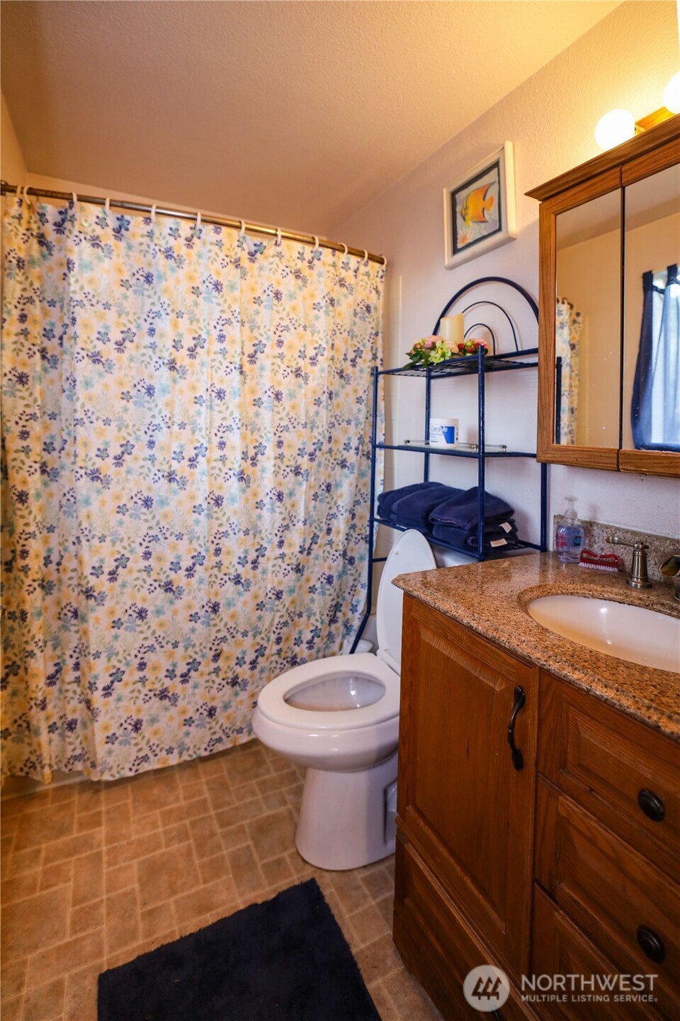 3506 SR 105 Grayland, WA 98547 - Photo 7 of 25 a bathroom with a sink toilet and shower