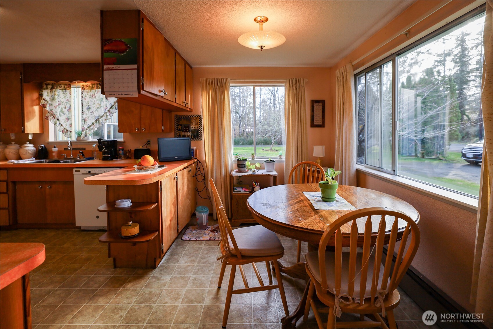 3506 SR 105 Grayland, WA 98547 - Photo 10 of 25 a view of a dining room with furniture window and outside view
