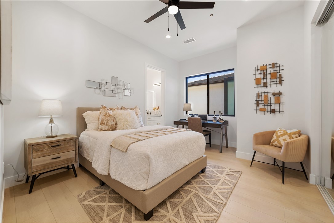 2027 Vía Monserate Fallbrook, CA 92028 - Photo 24 of 66 a bedroom with a bed and a couch