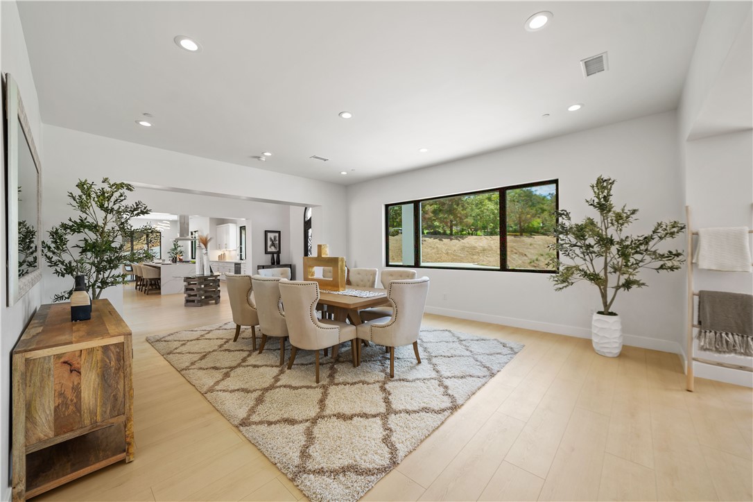 2027 Vía Monserate Fallbrook, CA 92028 - Photo 36 of 66 a living room with furniture and a potted plant