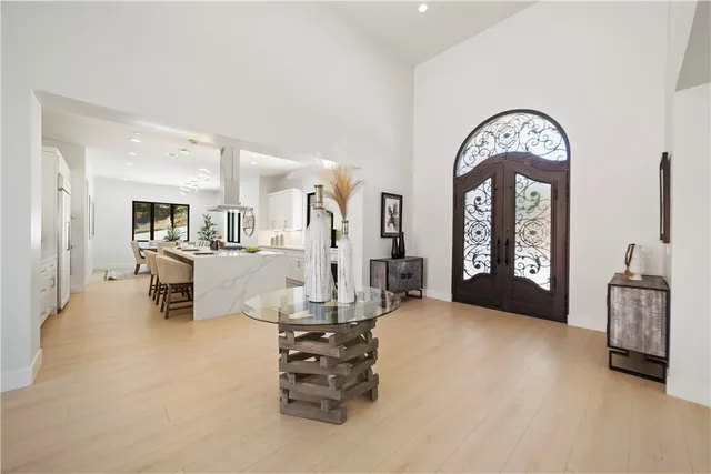 a large kitchen with stainless steel appliances lots of counter top space