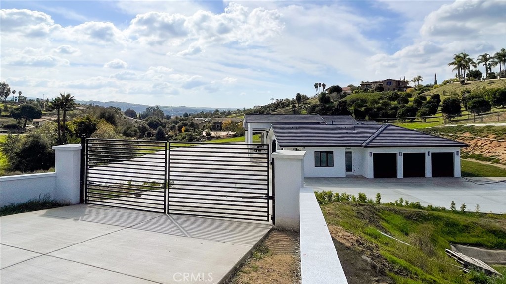 2027 Vía Monserate Fallbrook, CA 92028 - Photo 4 of 66 an aerial view of a house with a yard