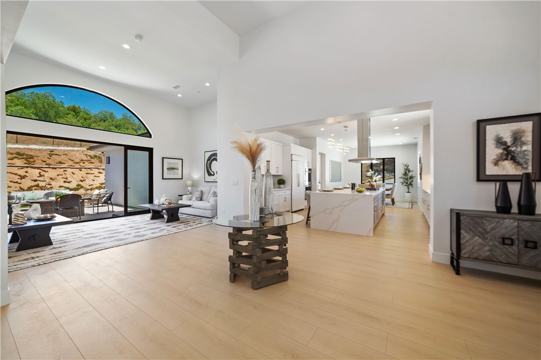 2027 Vía Monserate Fallbrook, CA 92028 - Photo 43 of 66 a living room with furniture and a large window