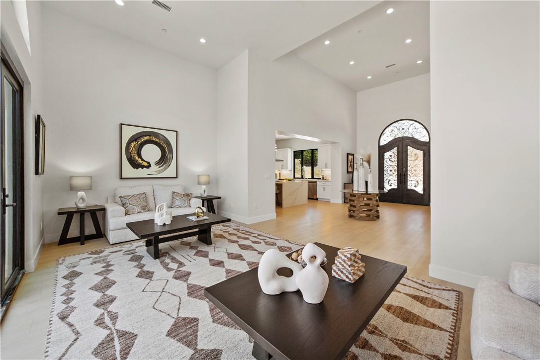 2027 Vía Monserate Fallbrook, CA 92028 - Photo 45 of 66 a living room with furniture and wooden floor