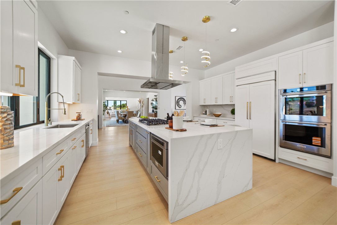 2027 Vía Monserate Fallbrook, CA 92028 - Photo 50 of 66 a large kitchen with stainless steel appliances lots of counter top space