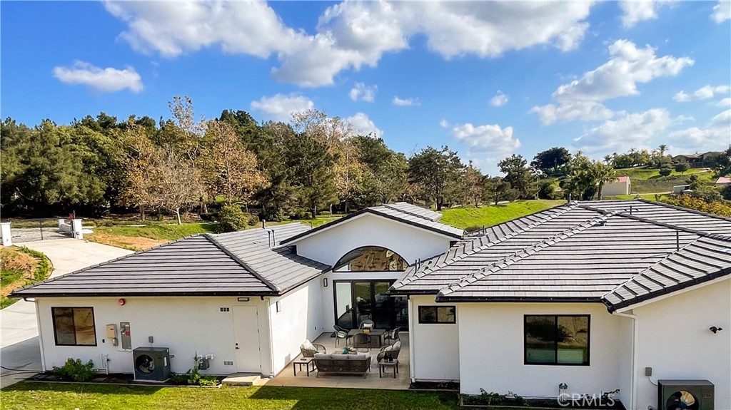 2027 Vía Monserate Fallbrook, CA 92028 - Photo 63 of 66 a front view of a house with garden