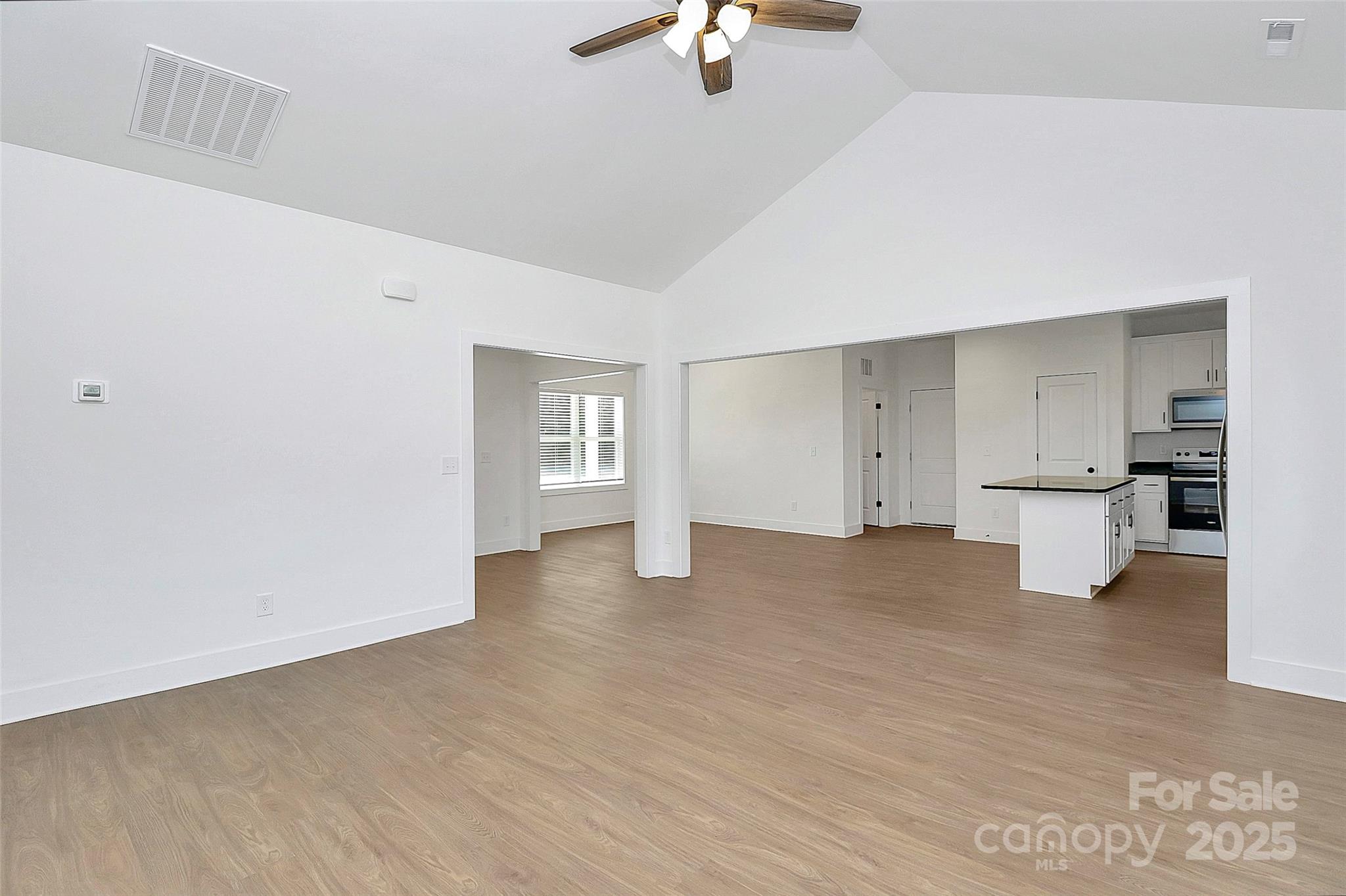 6154 Lowder Road Salisbury, NC 28147 - Photo 11 of 36 a view of empty room with kitchen and sink