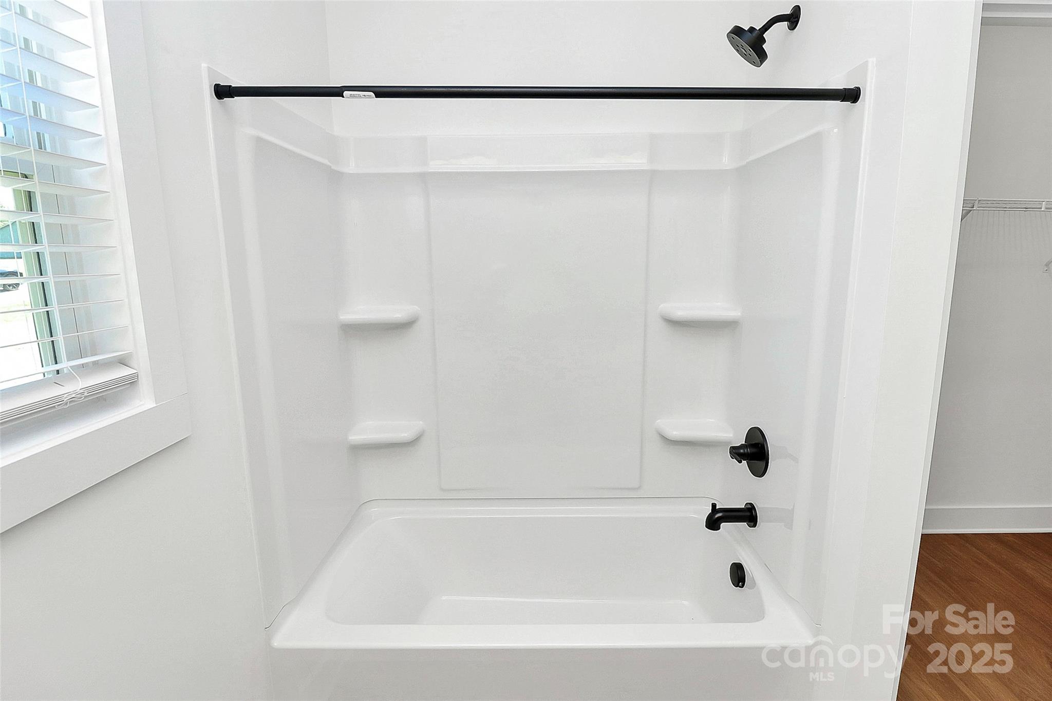 6154 Lowder Road Salisbury, NC 28147 - Photo 25 of 36 a bathroom with a shower and a bathtub