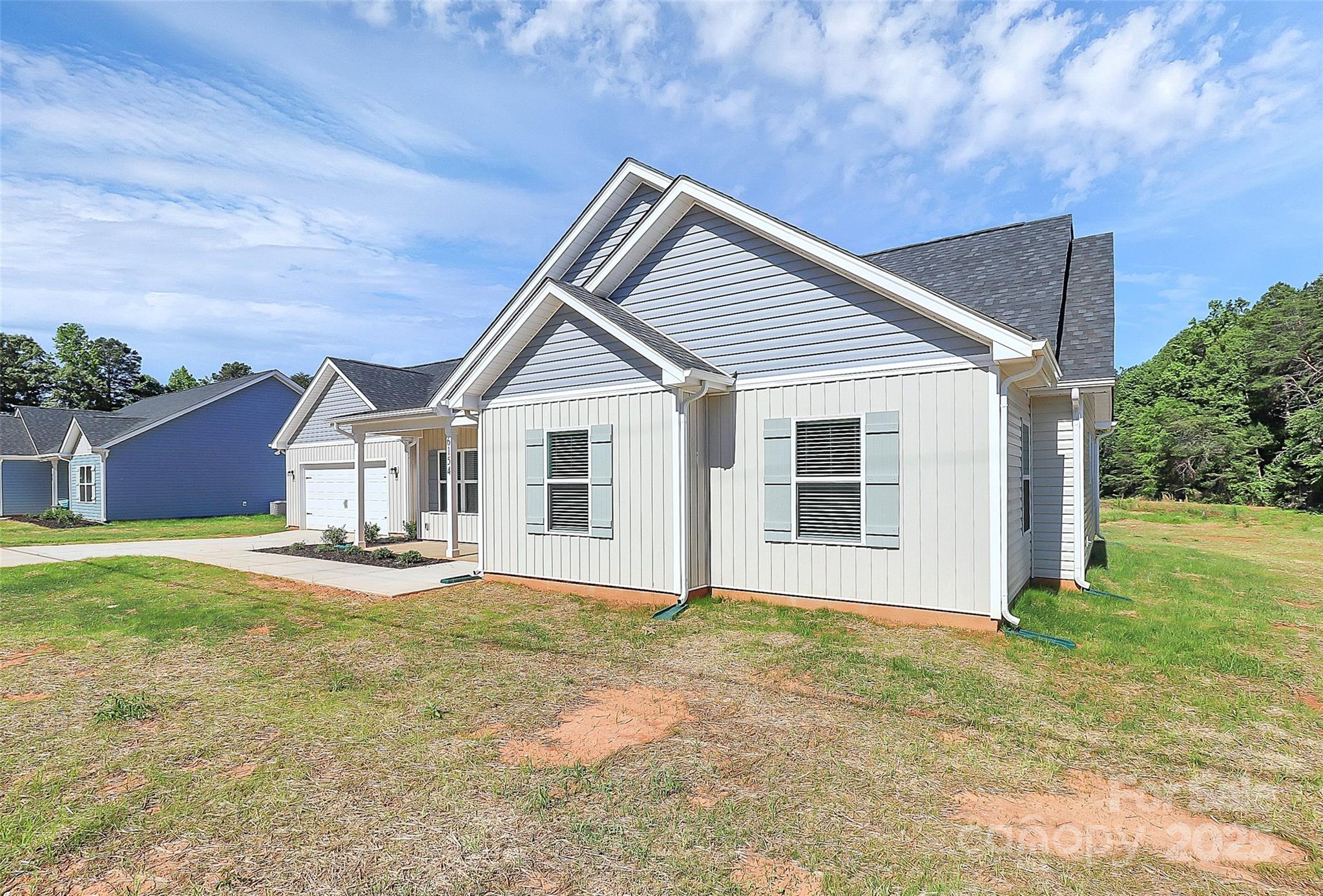 6154 Lowder Road Salisbury, NC 28147 - Photo 33 of 36 a view of a yard in front of a house with a yard