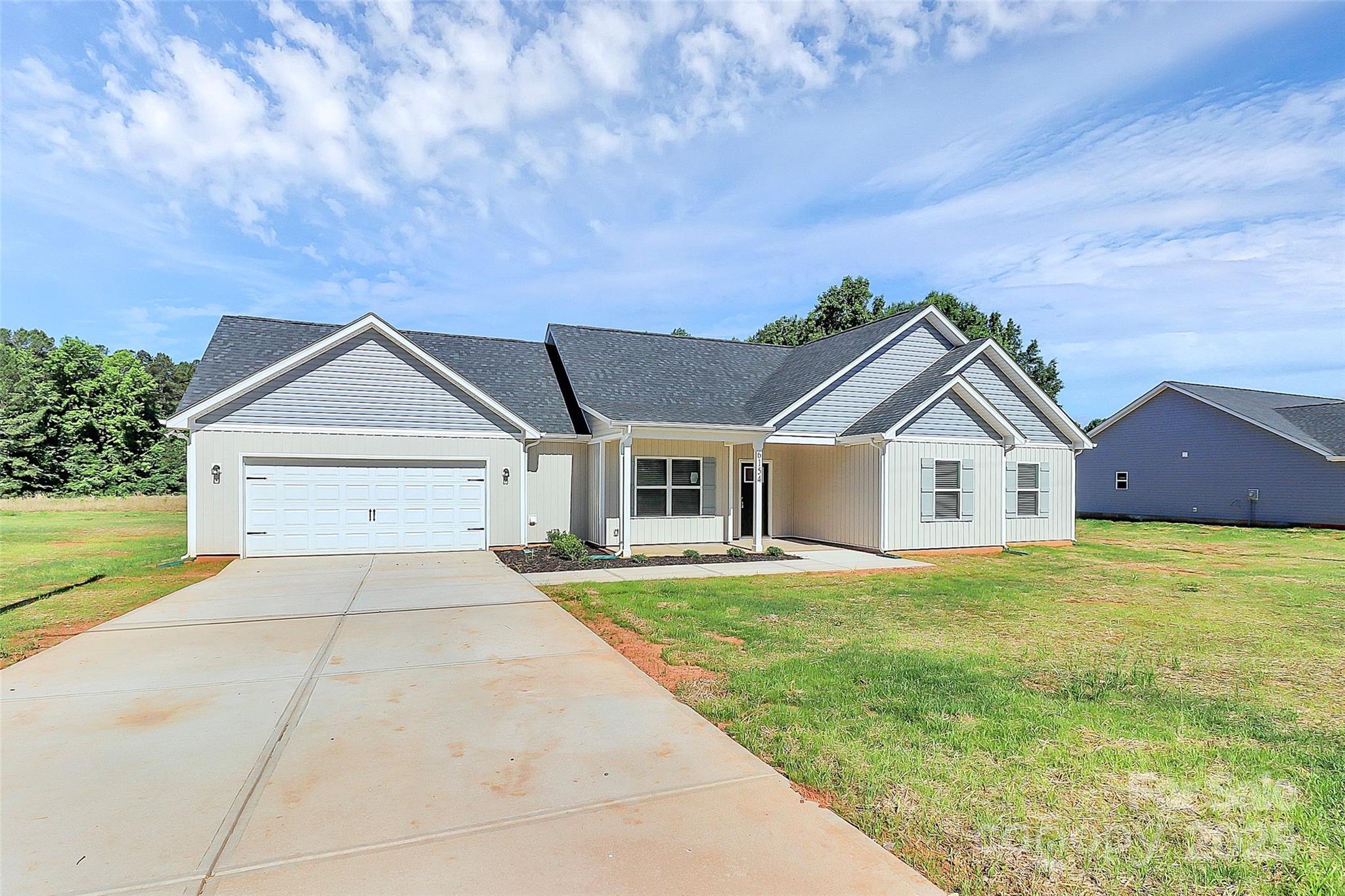6154 Lowder Road Salisbury, NC 28147 - Photo 34 of 36 a view of house with yard and green space