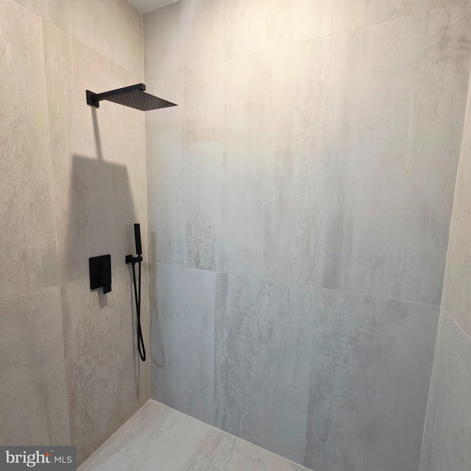 714 Chestnut Street, Unit 3F Philadelphia, PA 19106 - Photo 13 of 16 a bathroom with a shower and toilet