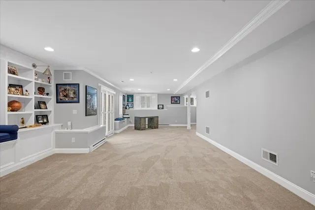 a view of a livingroom with furniture and windows