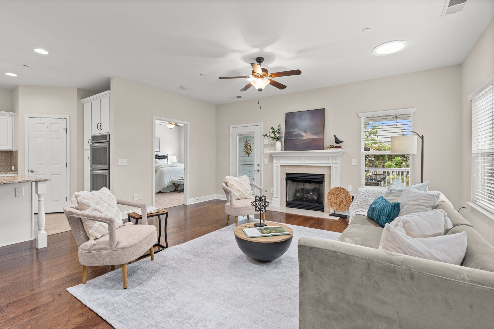 307 Rafferty Court Franklin, TN 37064 - Photo 12 of 55 a living room with furniture and a fireplace