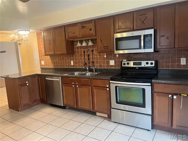 $170,000 | 8456 Braddock Drive, University City, MO 63132