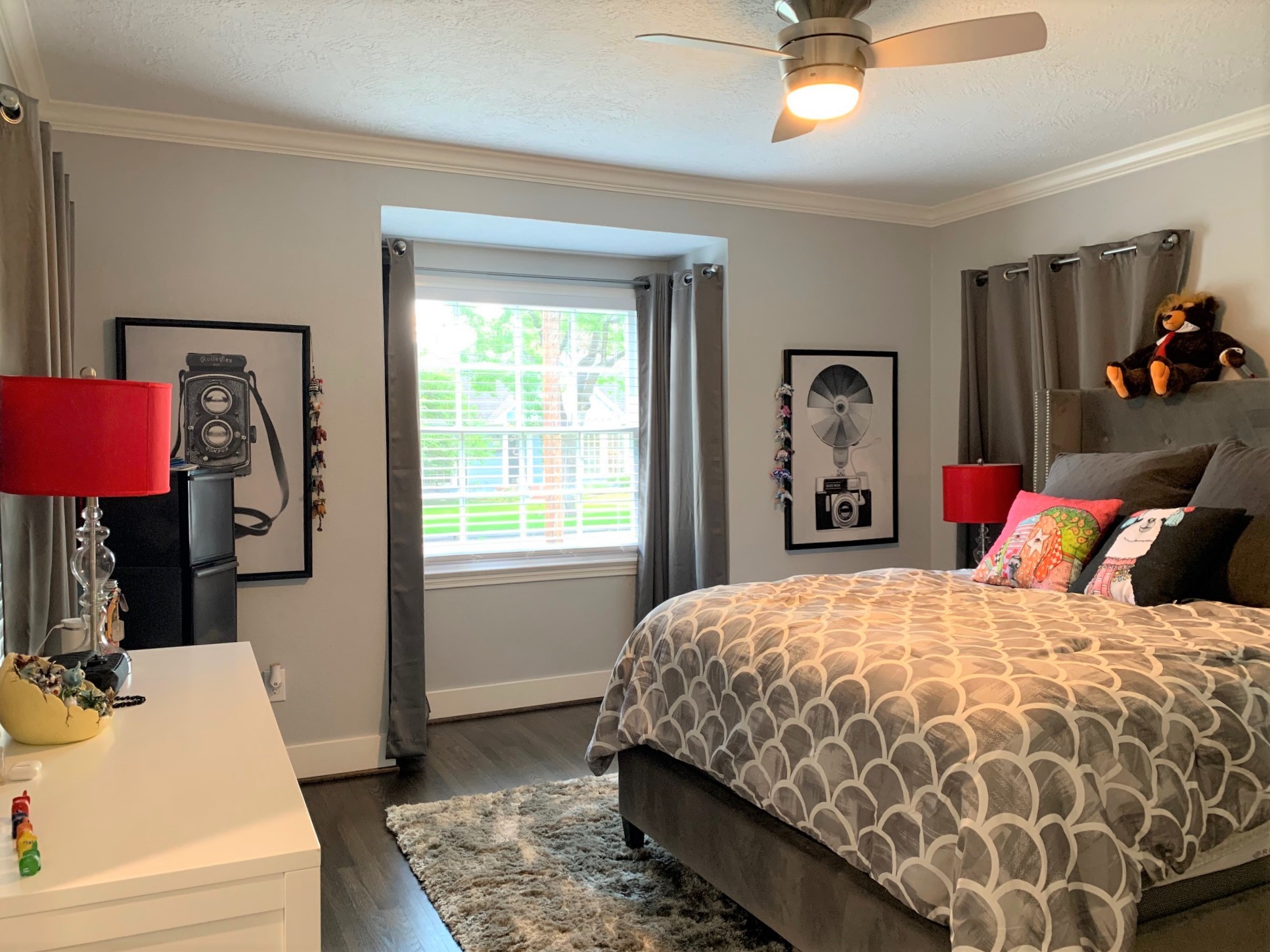 3909 Rice Boulevard Houston, TX 77005 - Photo 8 of 17 a bedroom with a bed and a couch