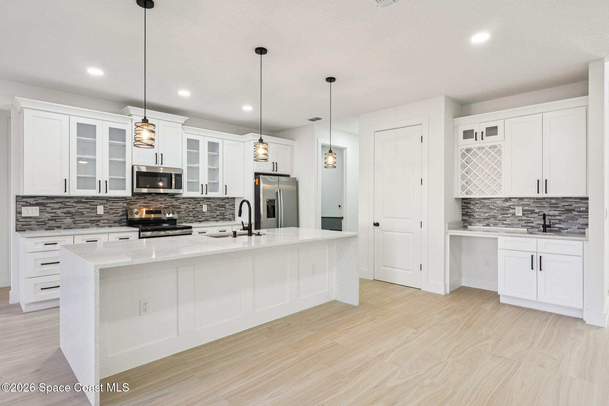 3271 Hall Road Southeast Palm Bay, FL 32909 - Photo 2 of 27 kitchen