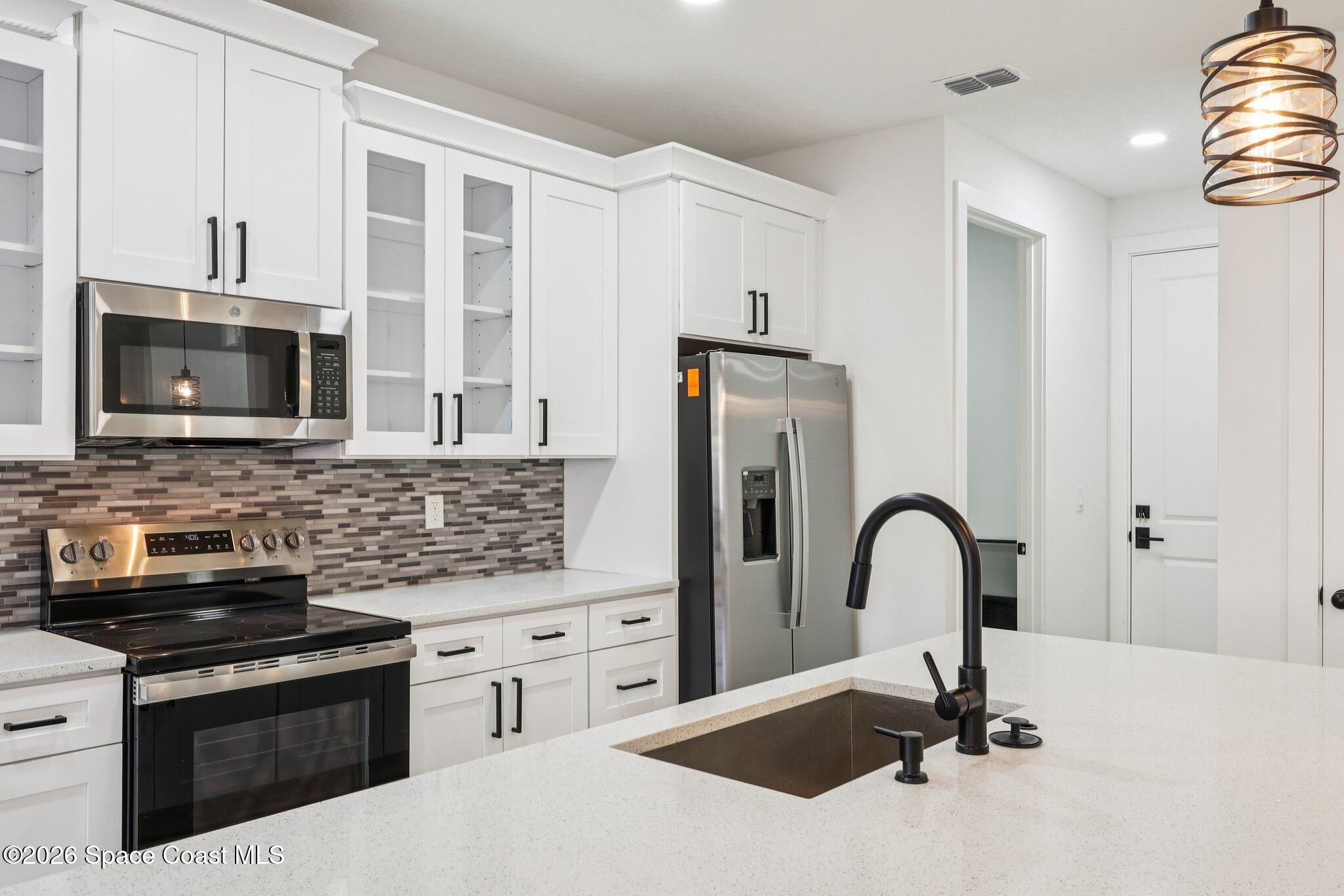 3271 Hall Road Southeast Palm Bay, FL 32909 - Photo 3 of 27 kitchen