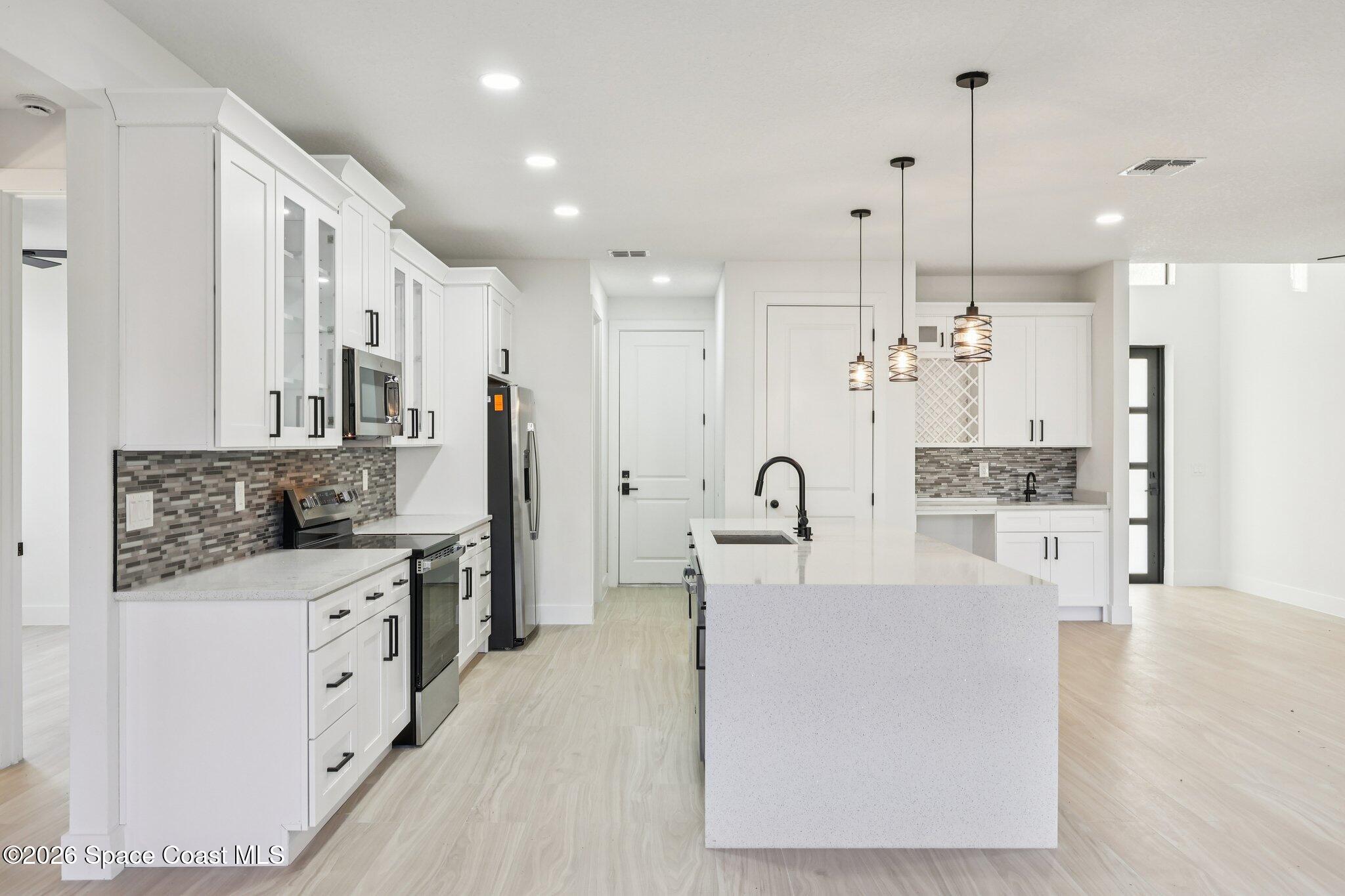 3271 Hall Road Southeast Palm Bay, FL 32909 - Photo 4 of 27 kitchen