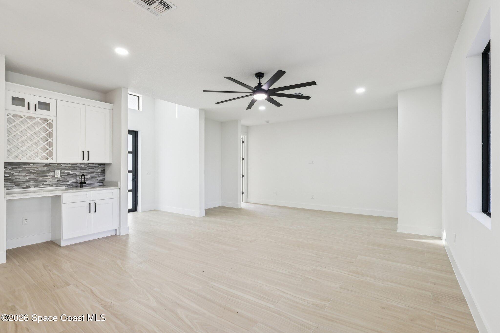 3271 Hall Road Southeast Palm Bay, FL 32909 - Photo 8 of 27 wetbar-hall