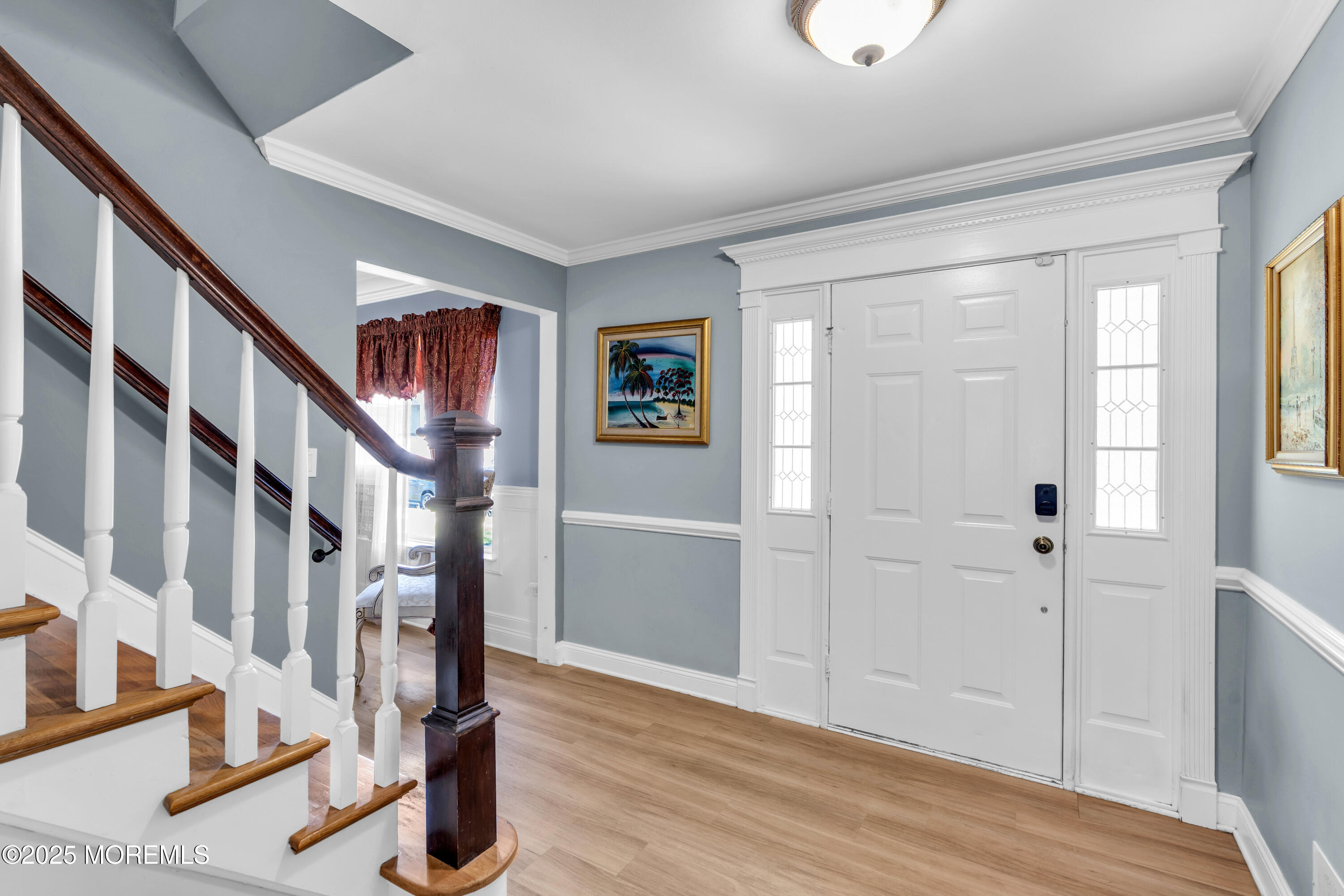 24 Abraham Drive Howell, NJ 07731 - Photo 6 of 40 a view of an entryway with wooden floor