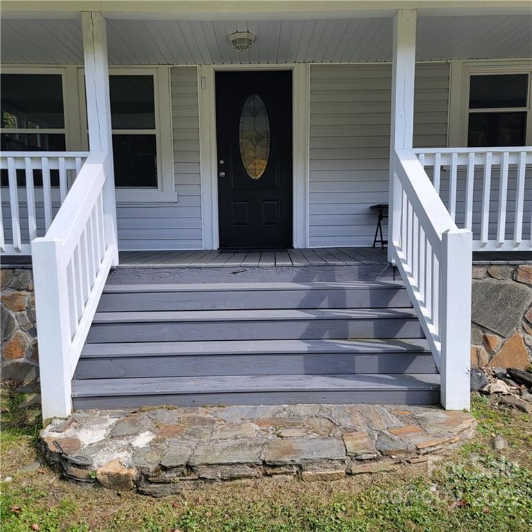 26 Possum Trot Road Bakersville, NC 28705 - Photo 6 of 22 a view of entryway with a front door
