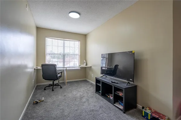 a room with furniture and windows