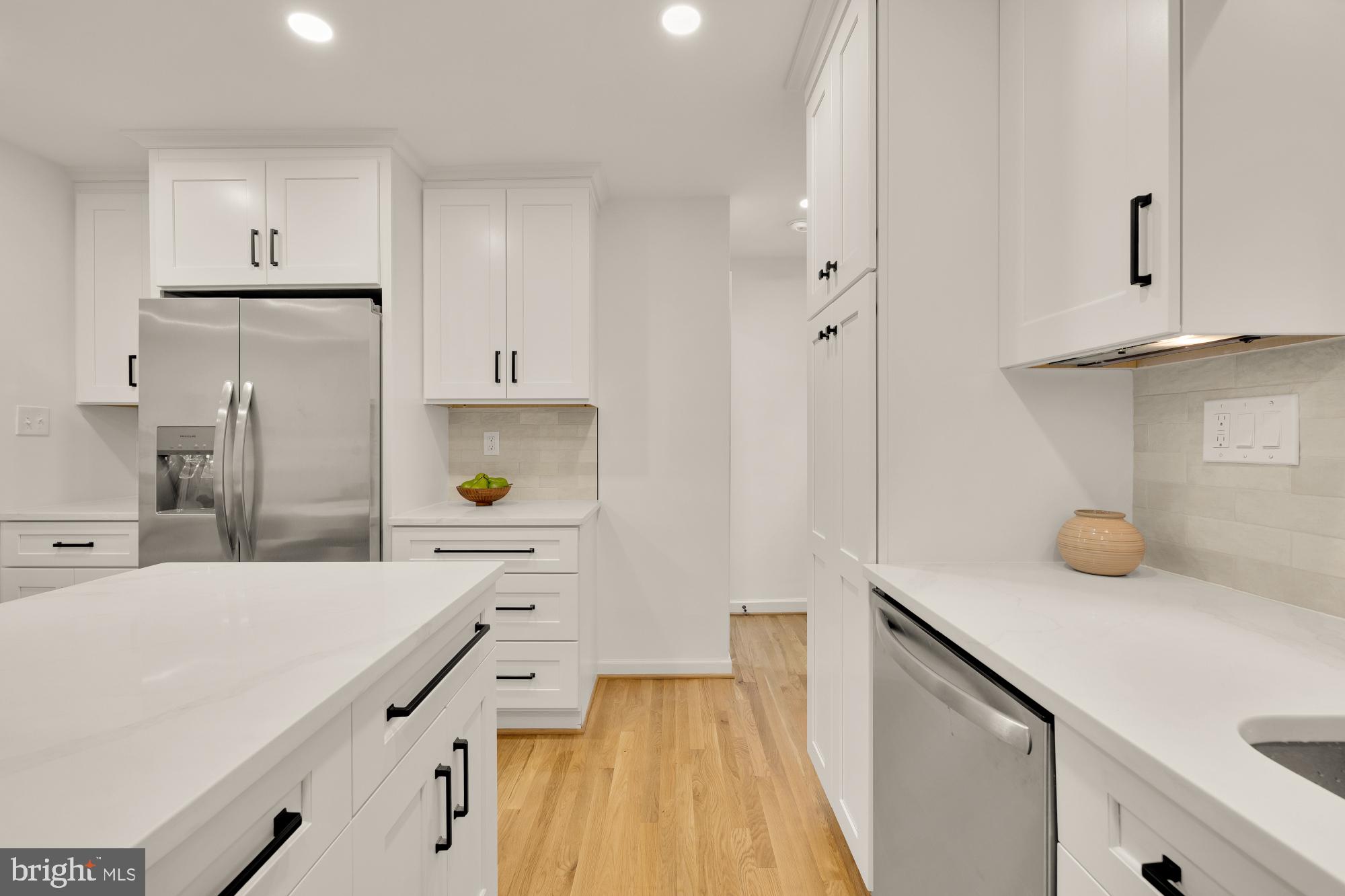 6232 18th Road North Arlington, VA 22205 - Photo 15 of 43 a kitchen with stainless steel appliances a sink dishwasher stove and refrigerator