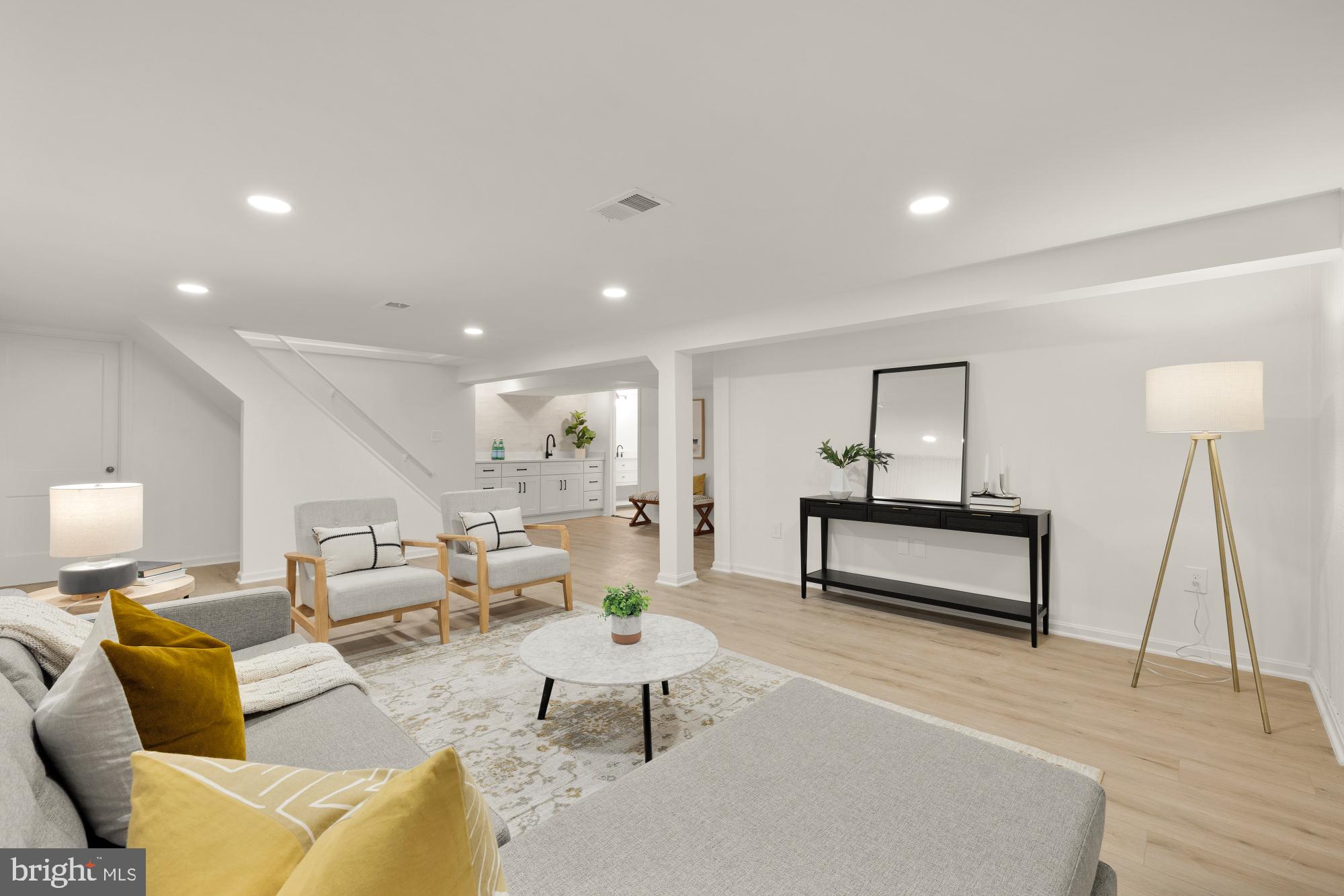 6232 18th Road North Arlington, VA 22205 - Photo 31 of 43 a living room with furniture a rug and a lamp