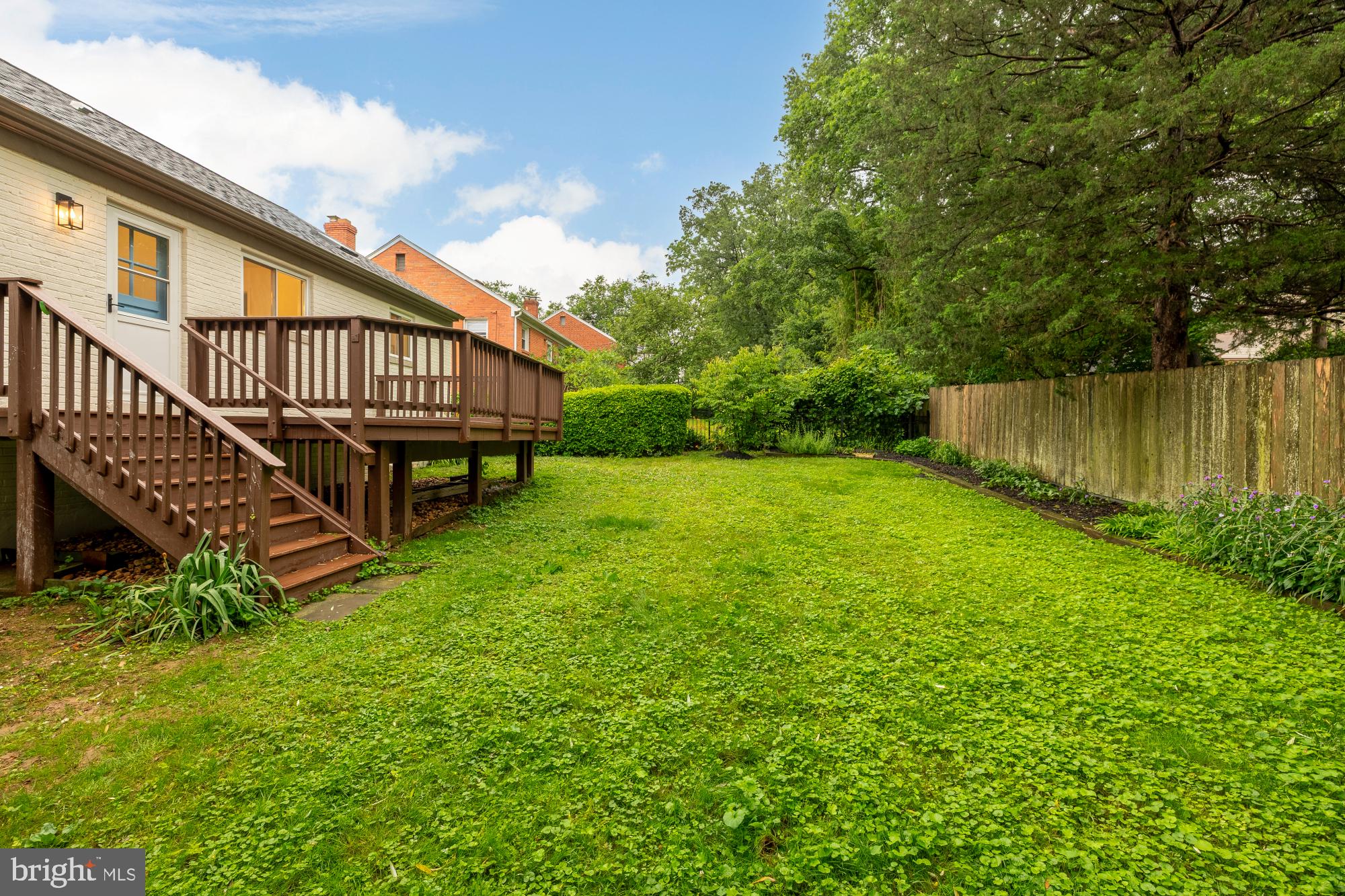 6232 18th Road North Arlington, VA 22205 - Photo 40 of 43 a view of a house with a yard and a wooden deck