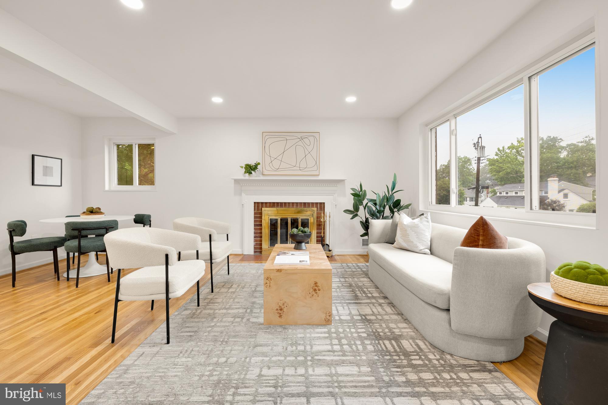 6232 18th Road North Arlington, VA 22205 - Photo 4 of 43 a living room with furniture a fireplace and a table