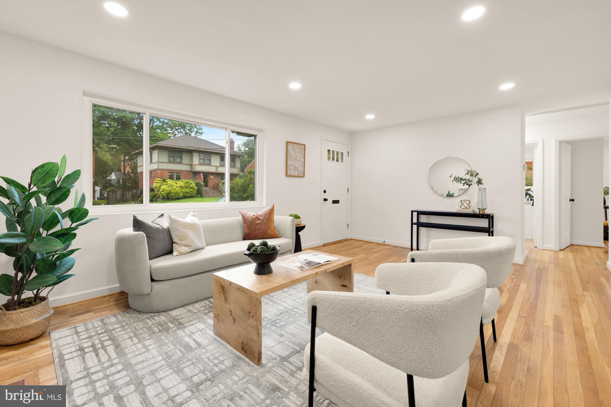 6232 18th Road North Arlington, VA 22205 - Photo 6 of 43 a living room with furniture and a large window