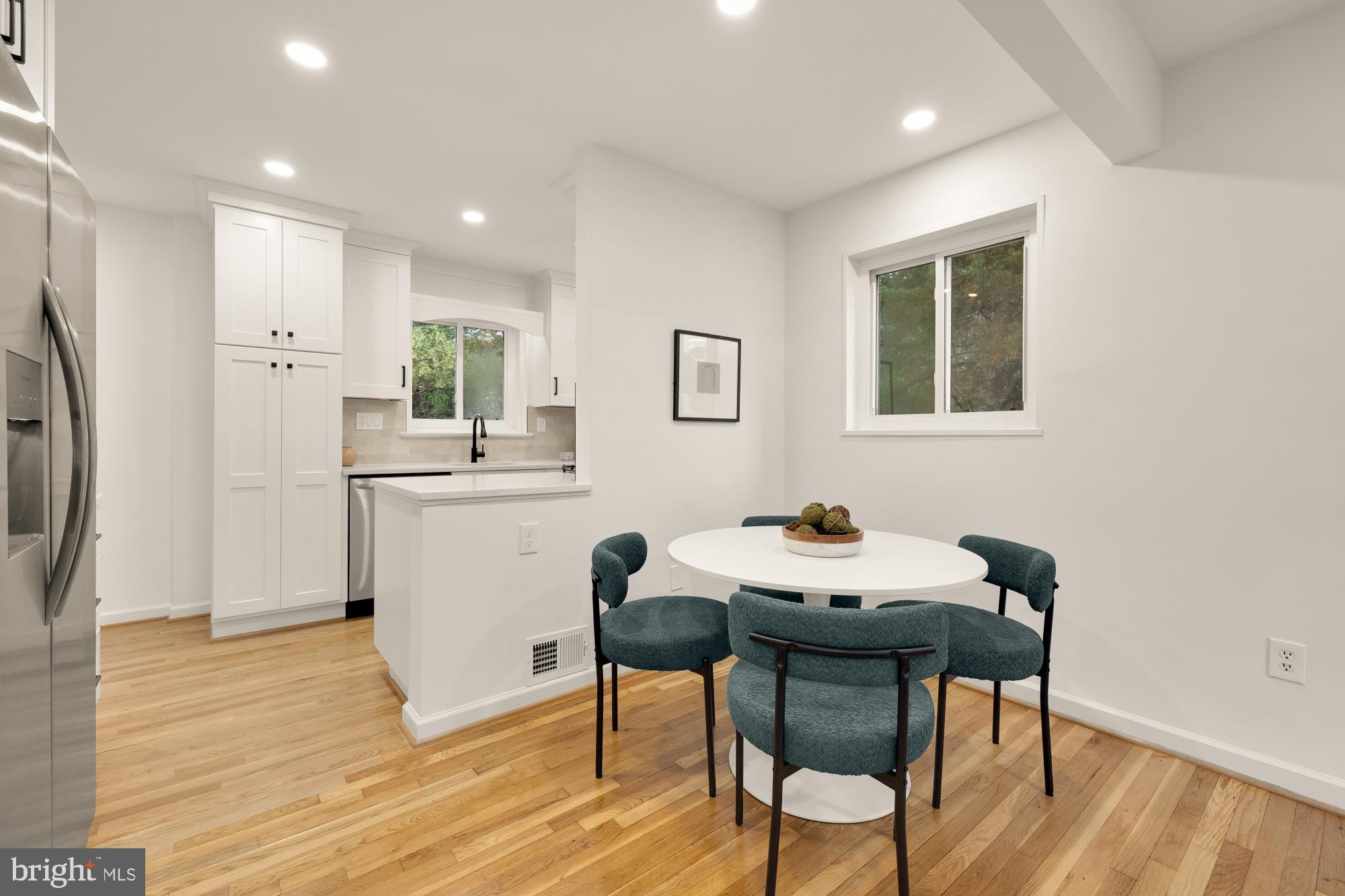 6232 18th Road North Arlington, VA 22205 - Photo 10 of 43 a view of a dining room with furniture and wooden floor