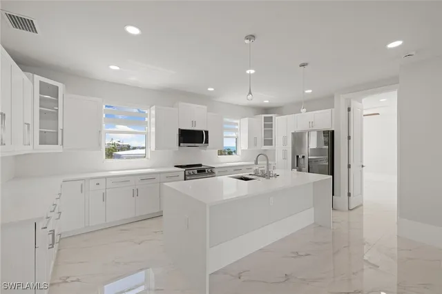 en empty room with window and outdoor view