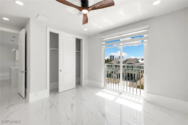 a view of a patio with wooden floor