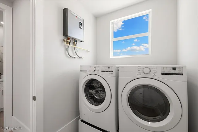a utility room with dryer and washer