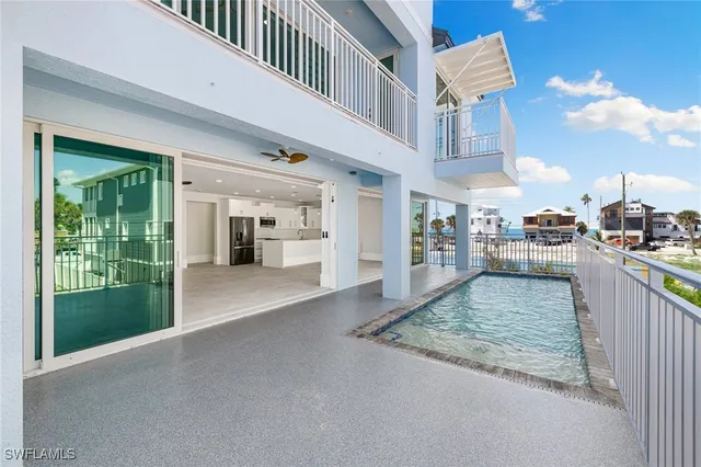 a view of living room and kitchen