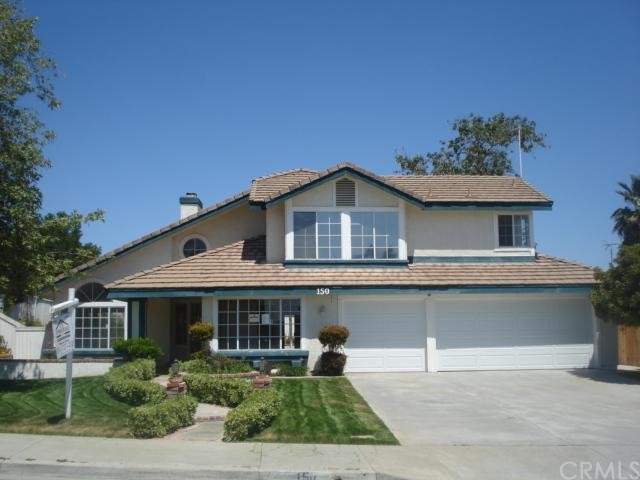 150 Port Royal Way Riverside, CA 92506 - Photo 1 of 1 a front view of a house with a garden