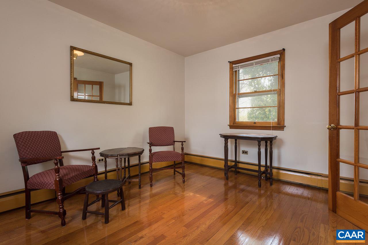 516 Ridge Street Charlottesville, VA 22902 - Photo 4 of 13 a view of a livingroom with furniture and a window