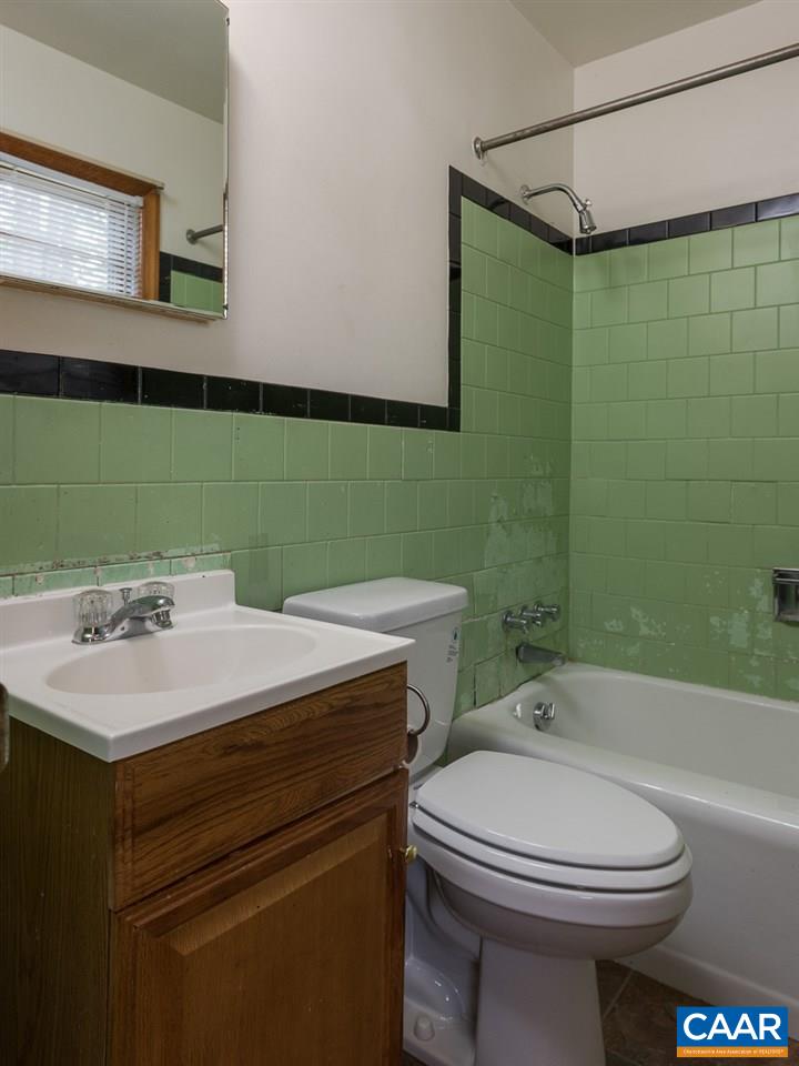 516 Ridge Street Charlottesville, VA 22902 - Photo 8 of 13 a bathroom with a sink toilet and shower
