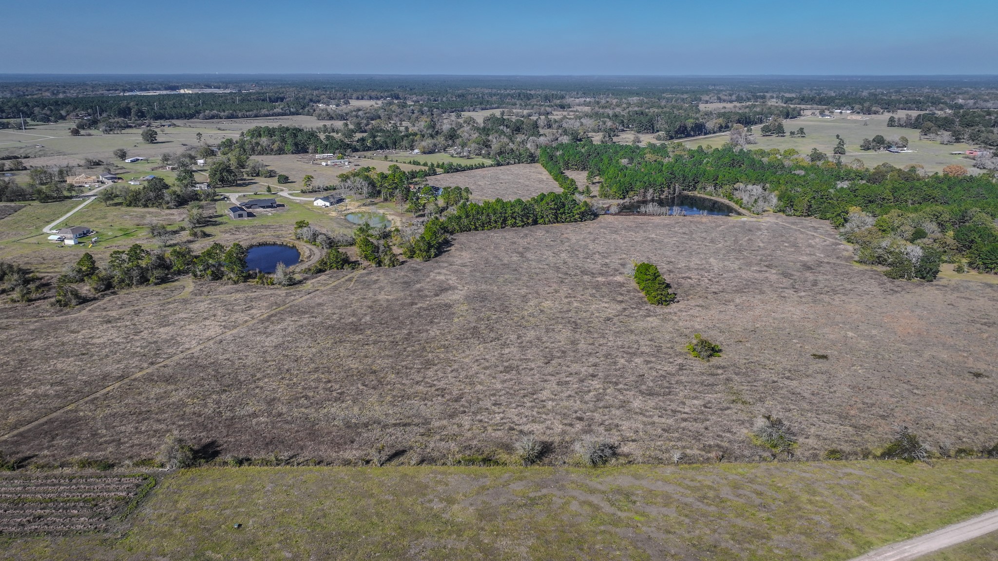 Tbd Lot 2 Tbd Road New Waverly, TX 77358 - Photo 2 of 24 an aerial view of multiple house