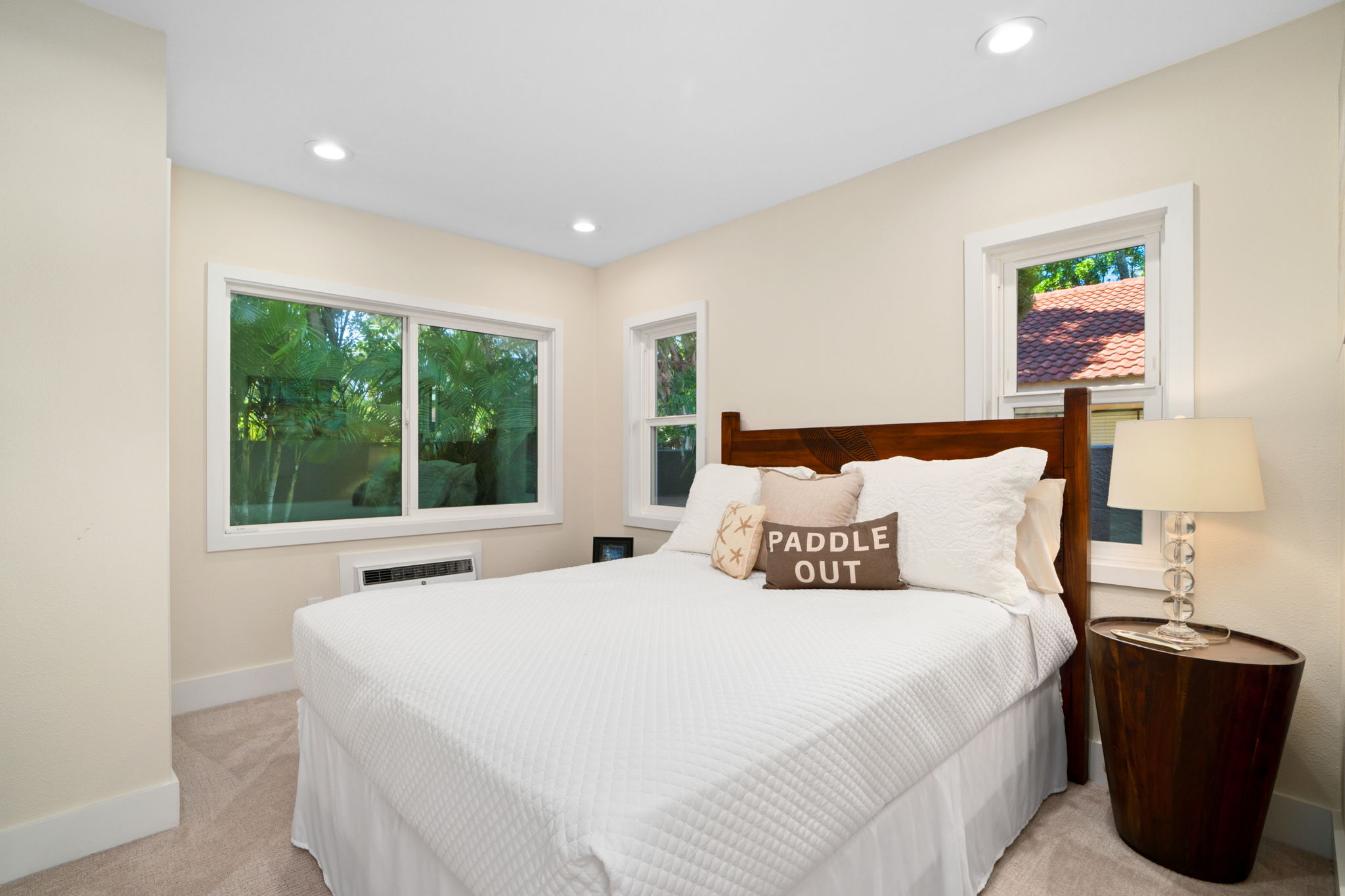 1753 Kelaukia Street Koloa, HI 96756 - Photo 22 of 27 a bedroom with a bed and wooden floor