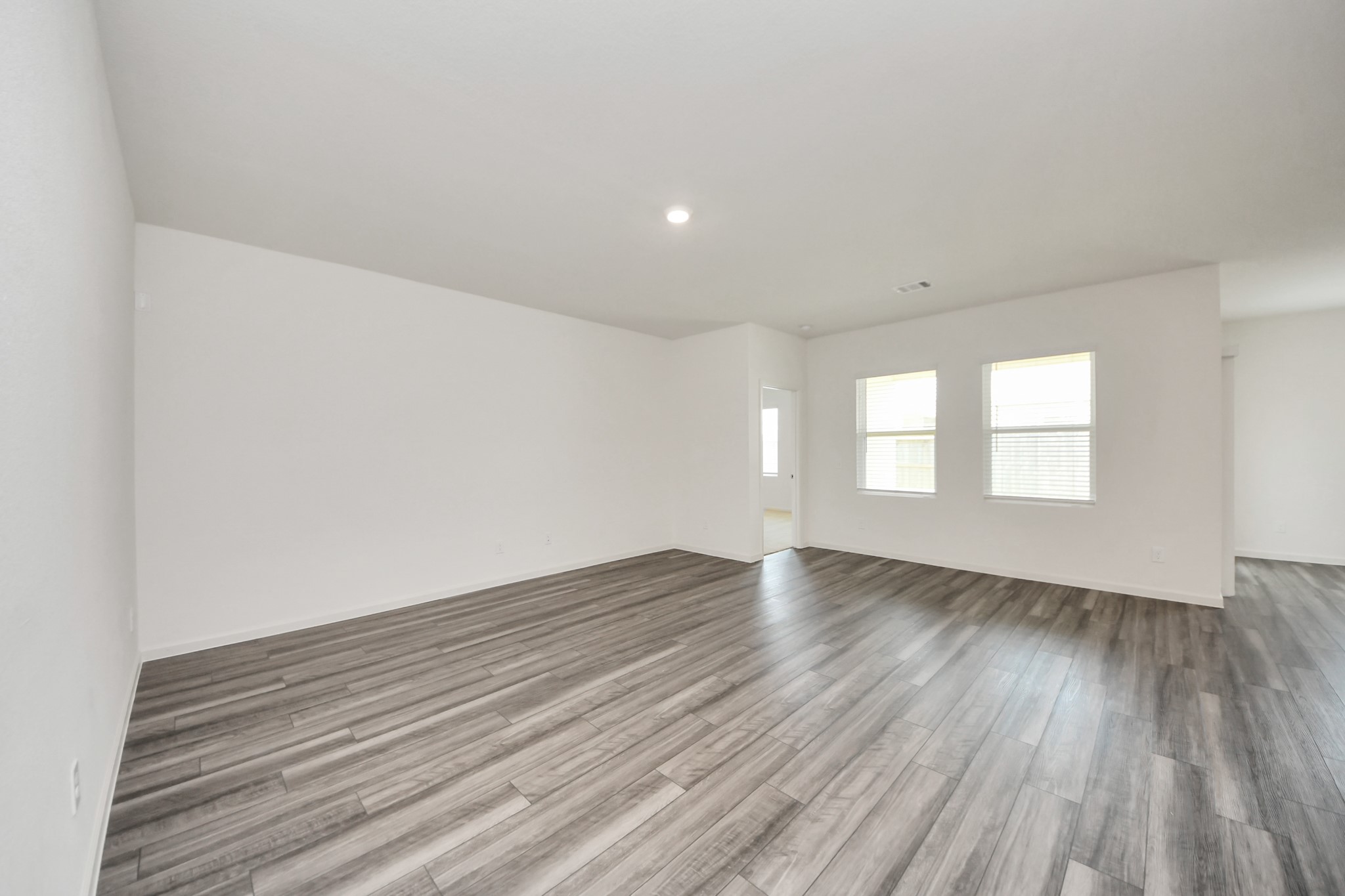 10307 Costa Ter Drive Rosharon, TX 77583 - Photo 21 of 49 a view of an empty room and wooden floor